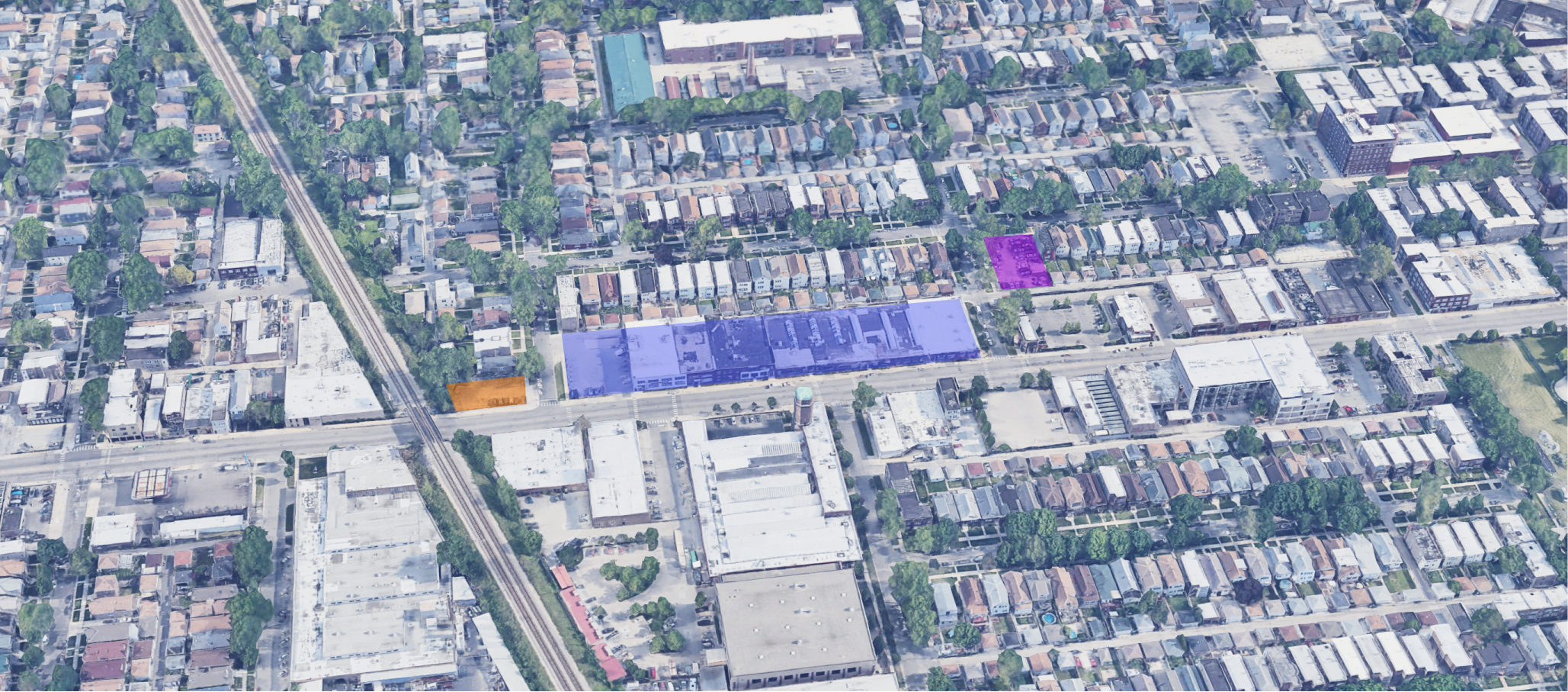 The land in development by Noah Properties, LLC. From left to right: 3202 N Kildare Avenue (orange), the planned townhomes (blue), and 4153 W Melrose Street (purple)