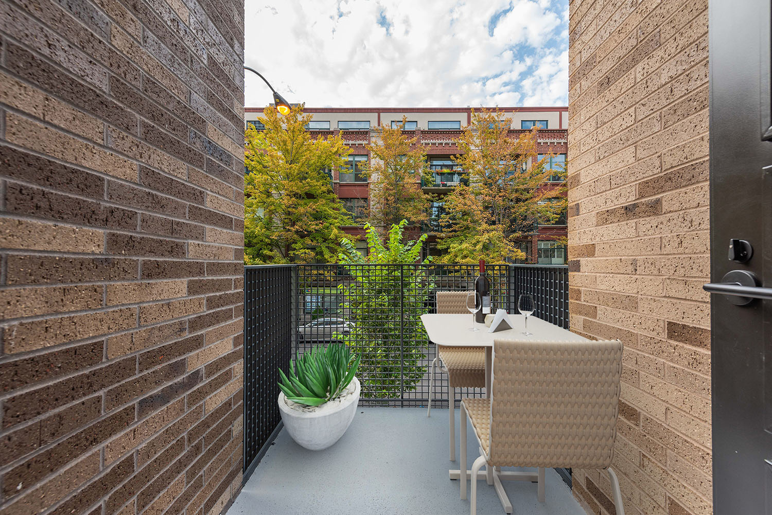 Second-Floor Balcony at Porte Townhomes. Image by Lendlease and The John Buck Company
