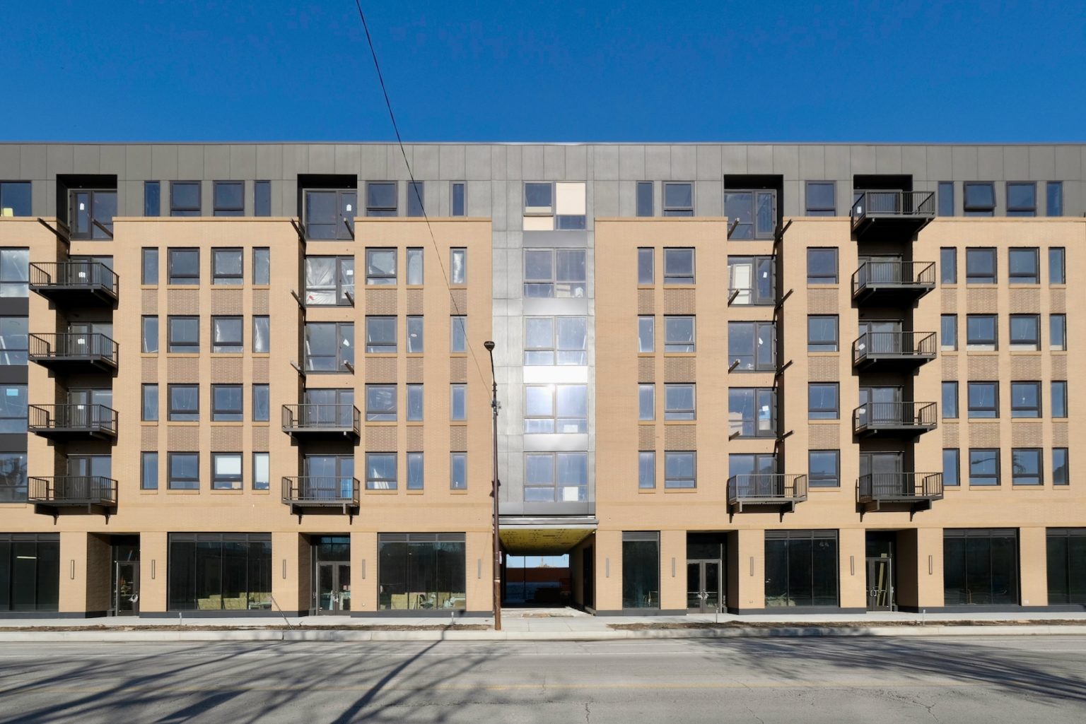 Exterior Construction Now Complete for 23rd Place at Southbridge in Near South Side Chicago YIMBY