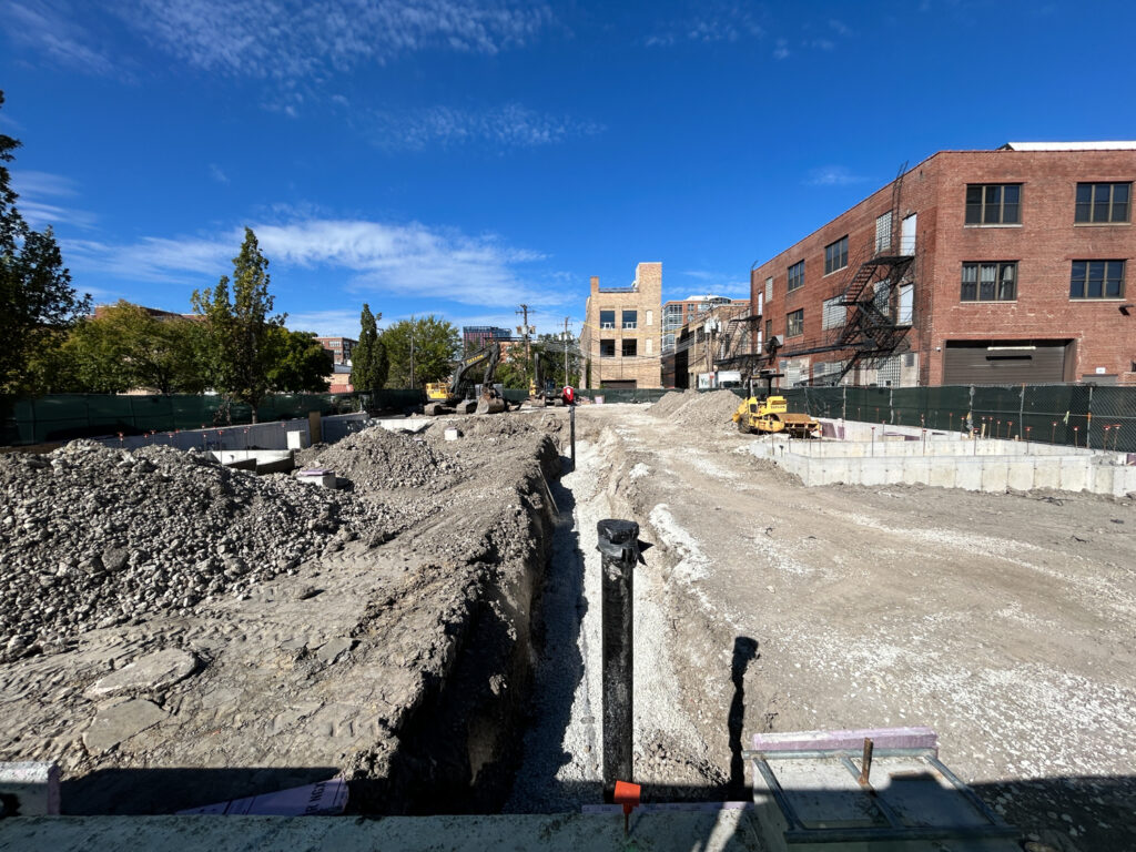 Concrete is in the ground for Kensington School West Loop Chicago YIMBY