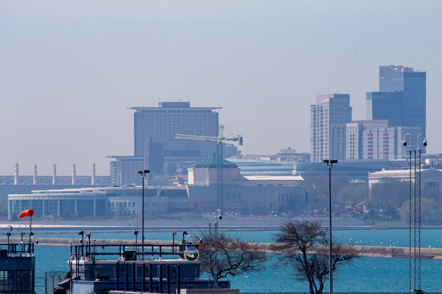 The tower crane and the most visible areas of construction are on the aquarium's north side, but the main entrance facing west is also under construction and is closed. That is not impacting business, as the facility remains open to the public, with a temporary entrance accessible on the south side of the building, facing Soldier Field.