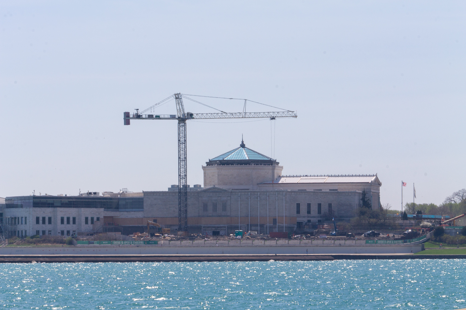 The tower crane and the most visible areas of construction are on the aquarium's north side, but the main entrance facing west is also under construction and is closed. That is not impacting business, as the facility remains open to the public, with a temporary entrance accessible on the south side of the building, facing Soldier Field.