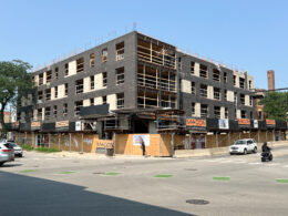 3605 N Ravenswood is a 5-story, 54-unit mixed use apartment building located at the corner of Addison and Ravenswood in the Lakeview neighborhood of Chicago. Located steps away from the Addison Street Brown line CTA along with being on the Addison Street CTA bus route, the building is planned as a Transit Oriented Development which allows the building to reduce its required parking down to 12 parking spaces and eliminate the need for a parking podium. The façade is composed of load bearing structural brick that is two different colors which creates a third layer to the façade independent from the brick and punched windows. The street corner of the building is highlighted by a large bay window that cantilevers out 5’ from the façade, adding depth to the kitchen, dining, and living room area of that unit and also providing an overhand for the entry at the corner retail space and shelter from the elements for those waiting for the CTA bus at Addison. The top of the building has a shared amenity space for all building residents to enjoy that faces south and has panoramic views of the skyline.