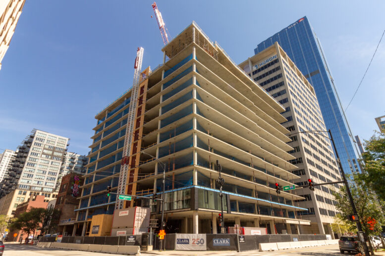 566 West Van Buren topped out, first glass