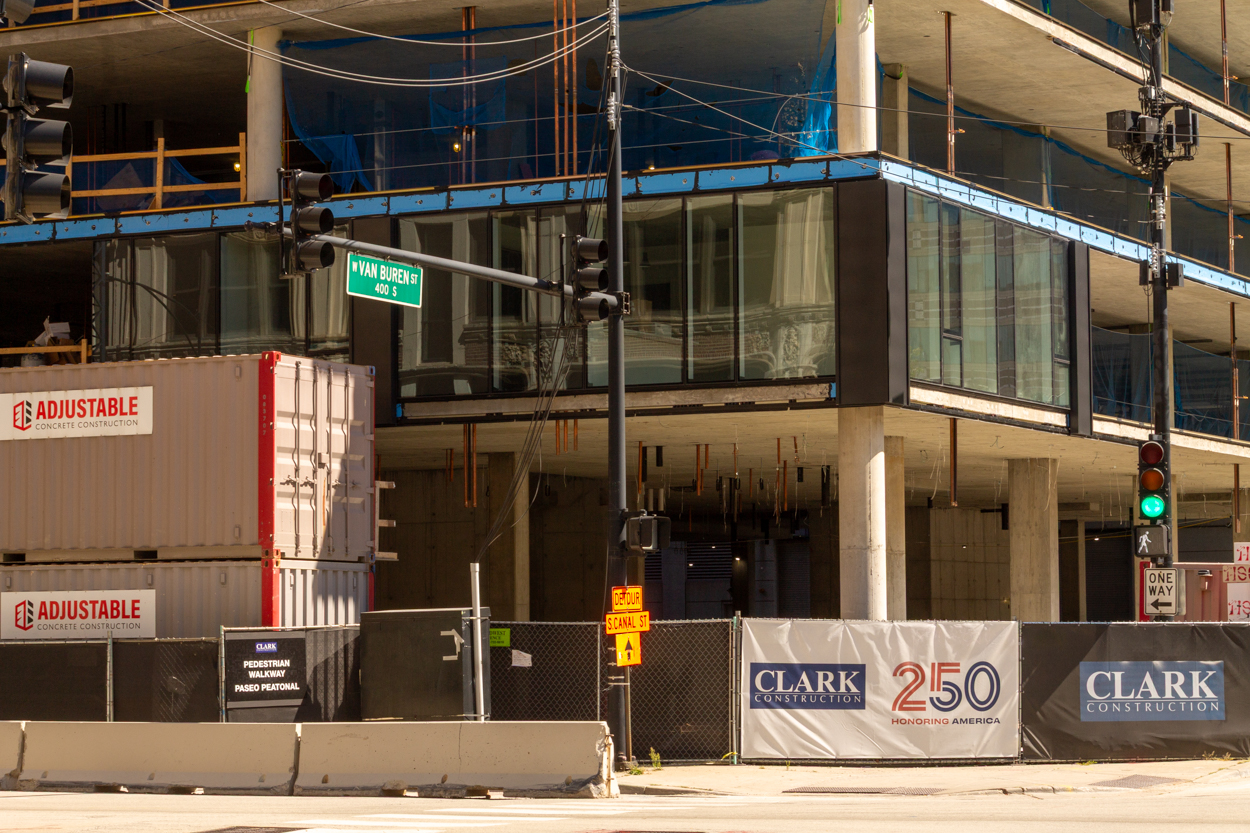 566 West Van Buren topped out, first glass